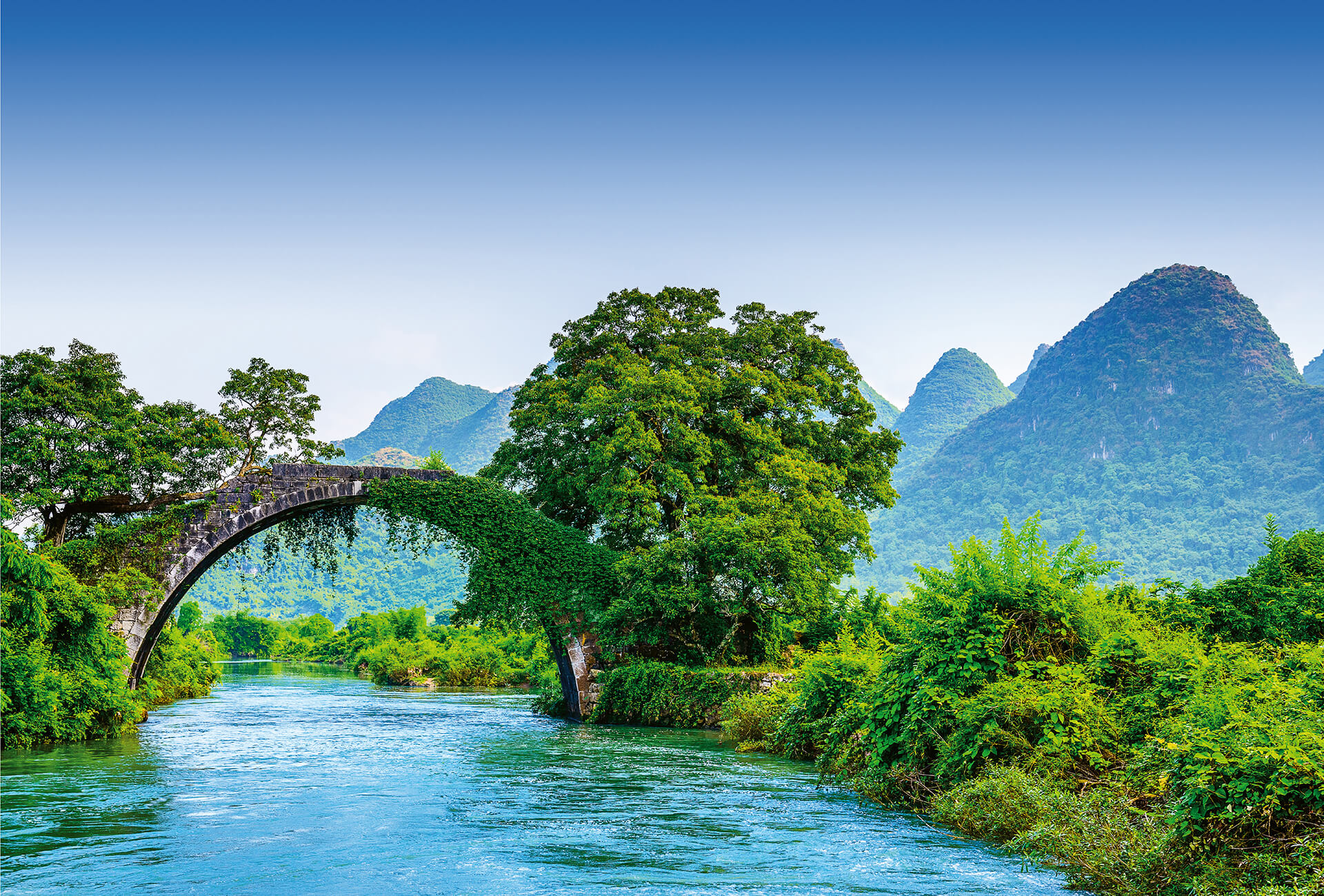 AS Fototapete Designwalls 2.0 Bridge Crosses A River In Chin